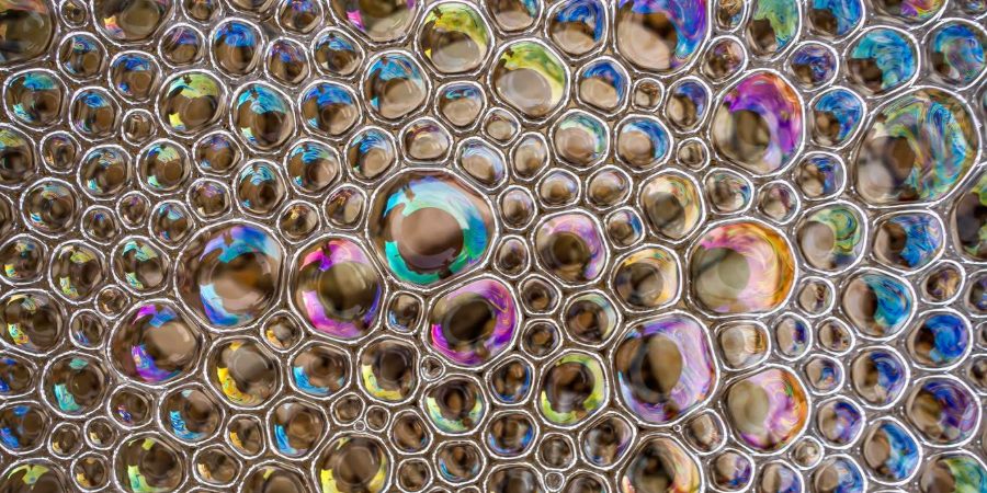 Rainbow-colored soap bubbles, close-up